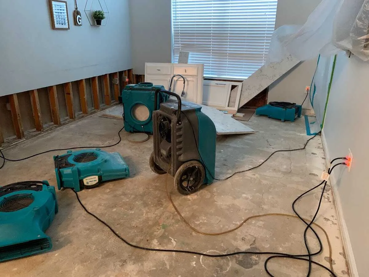 Dehumidifier in flood-cut room for Water Damage Restoration in Lantana